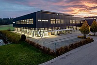 Interview Andy Kessler Flyer. Firmengebäude von Flyer mit Abendhimmel.